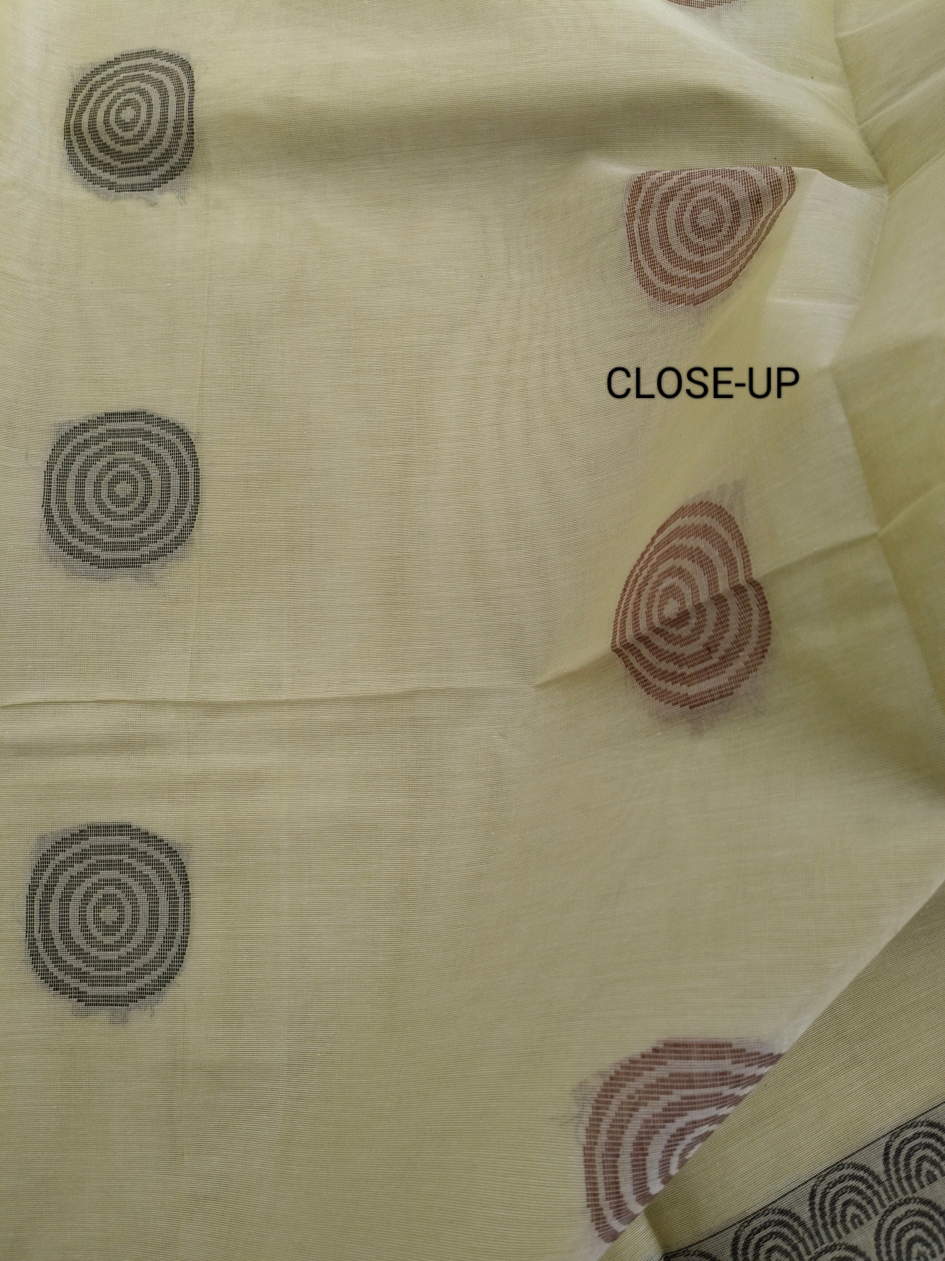 Lime cream cotton saree with thread buttas
