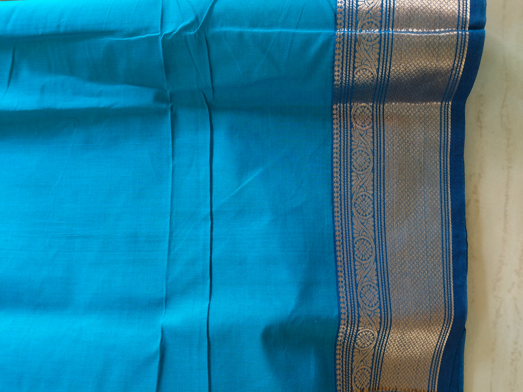 Blue chettinad cotton saree with Mango buttas and zari border