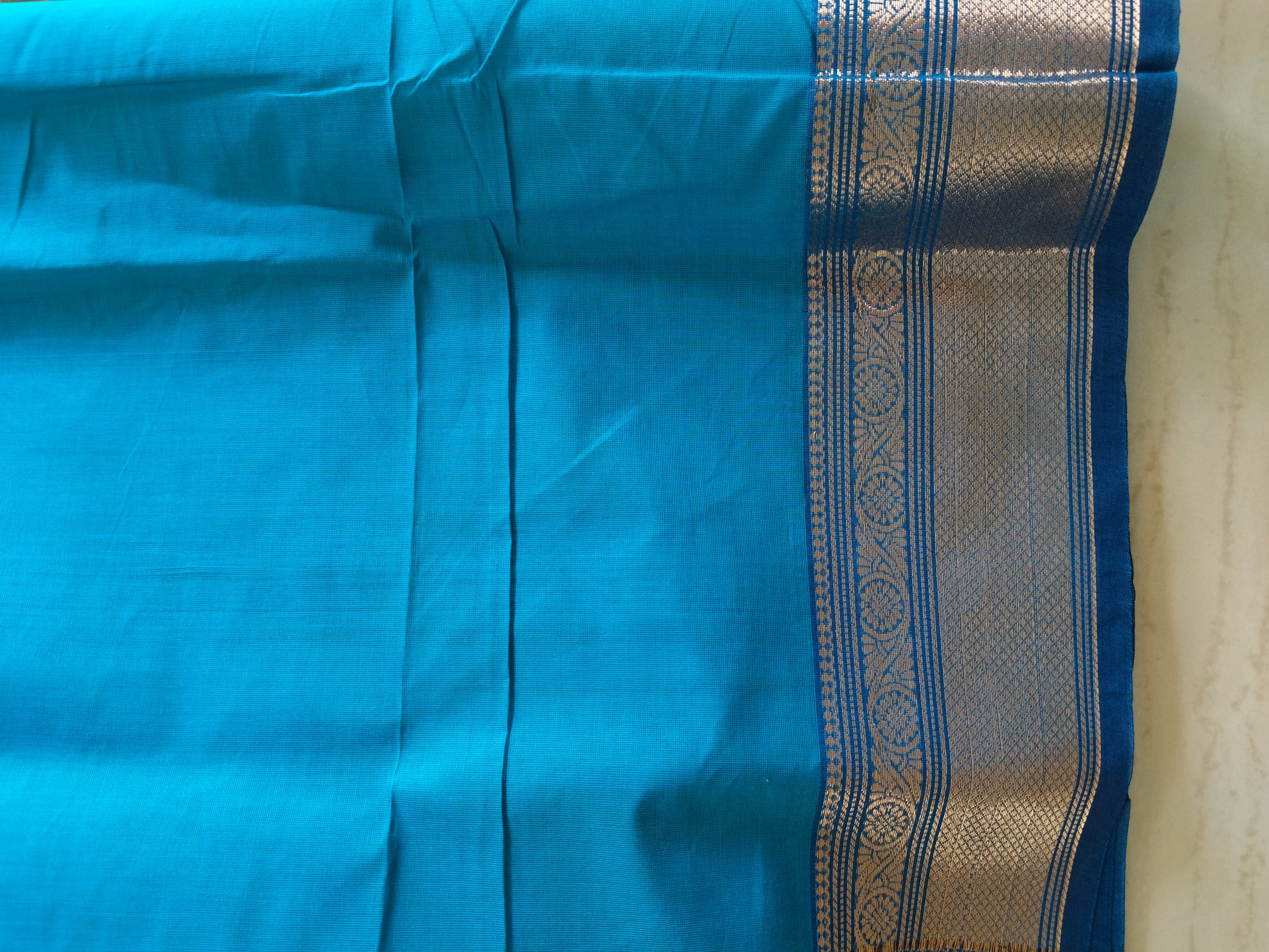 Blue chettinad cotton saree with Mango buttas and zari border