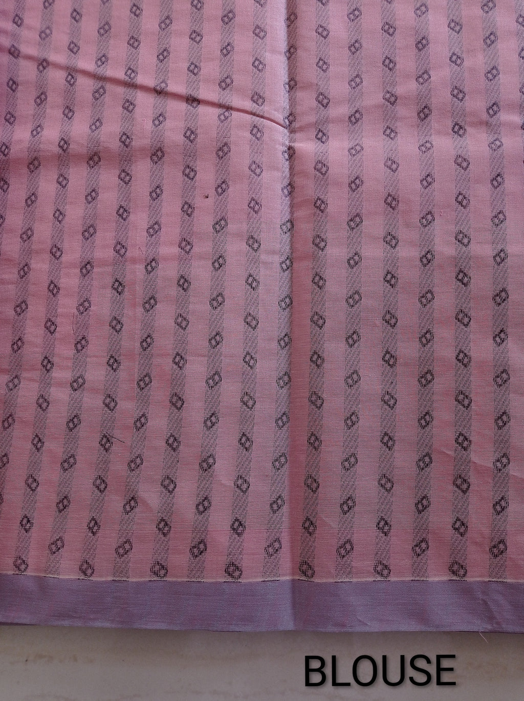 Pastel pink cotton saree with black buttas & one side temple border