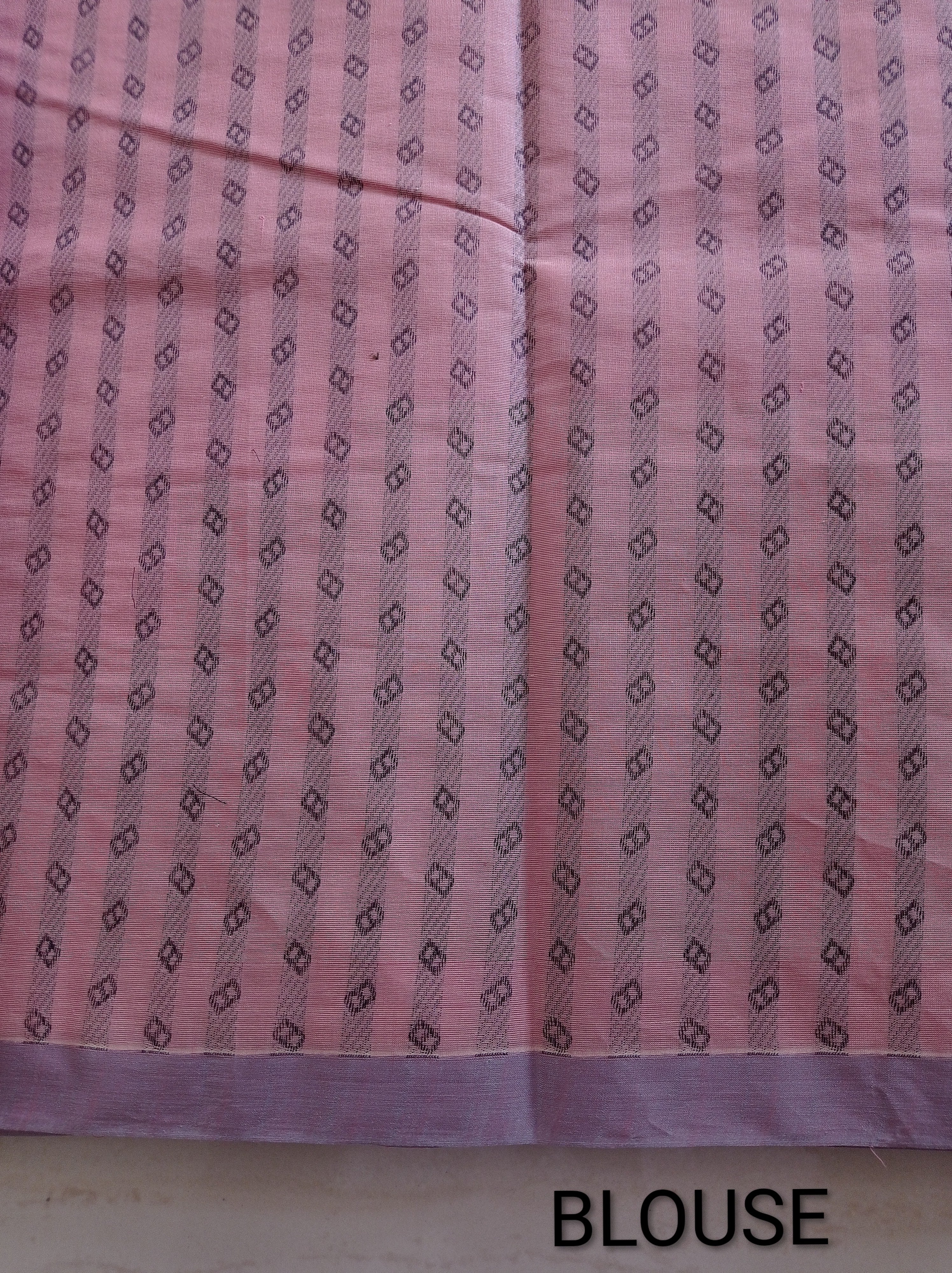 Pastel pink cotton saree with black buttas & one side temple border