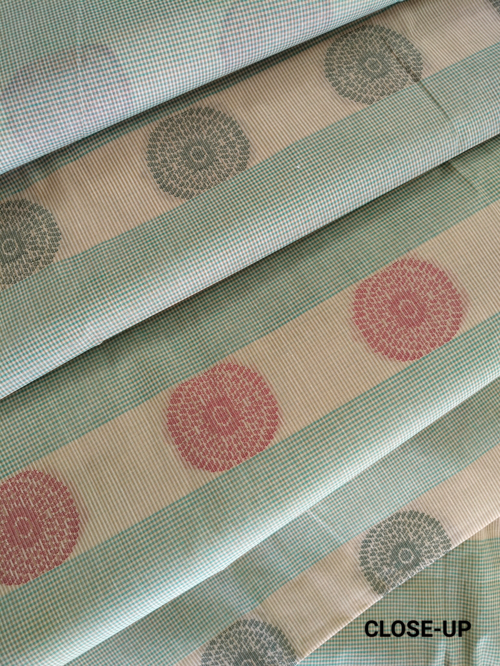 Green podi kattam & bisque beige cotton saree with zari border