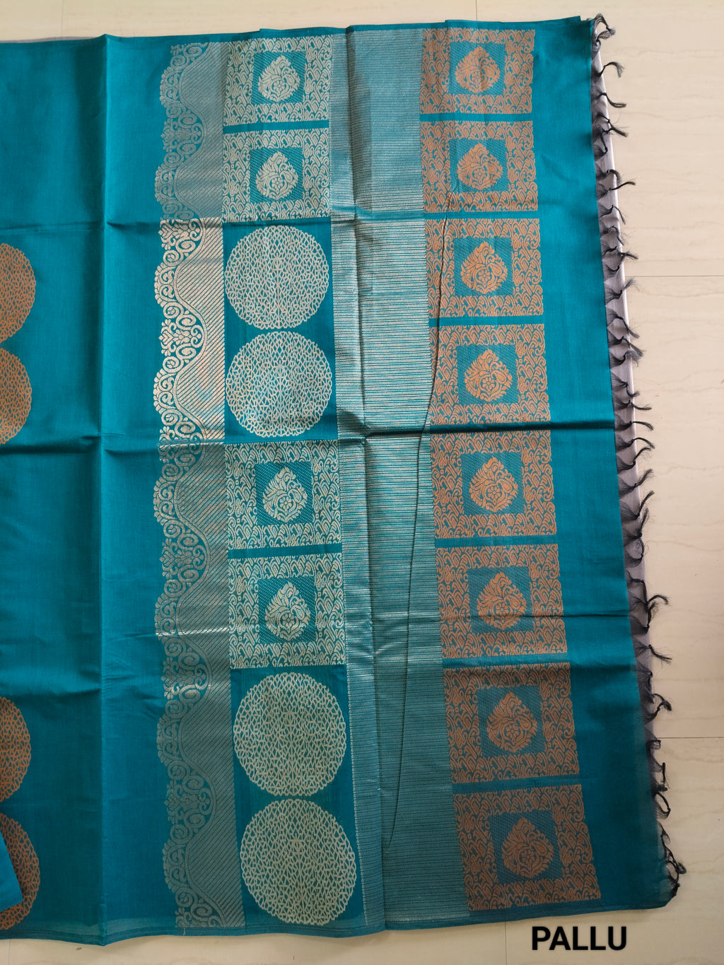 Blue cotton saree with silver & copper zari buttas