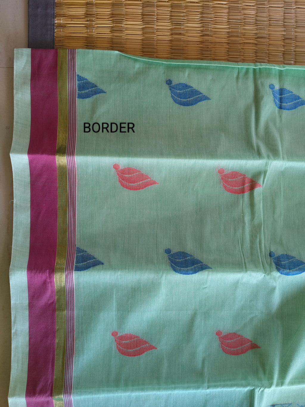 Tea green cotton saree with flower buttas