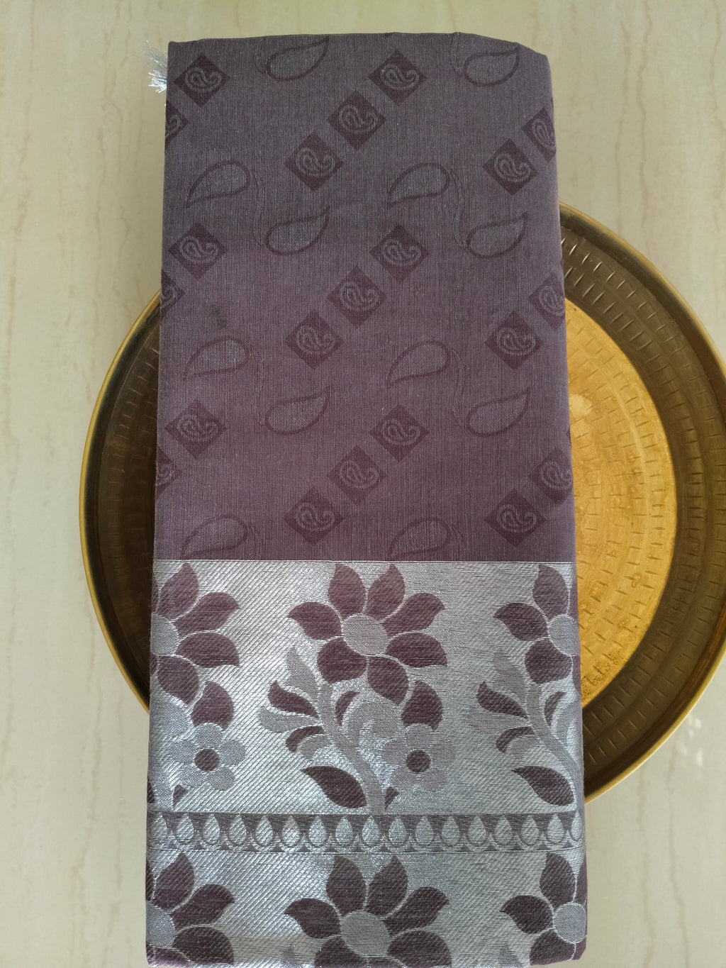 Chocolate brown embossed cotton saree with silver border and silver pallu