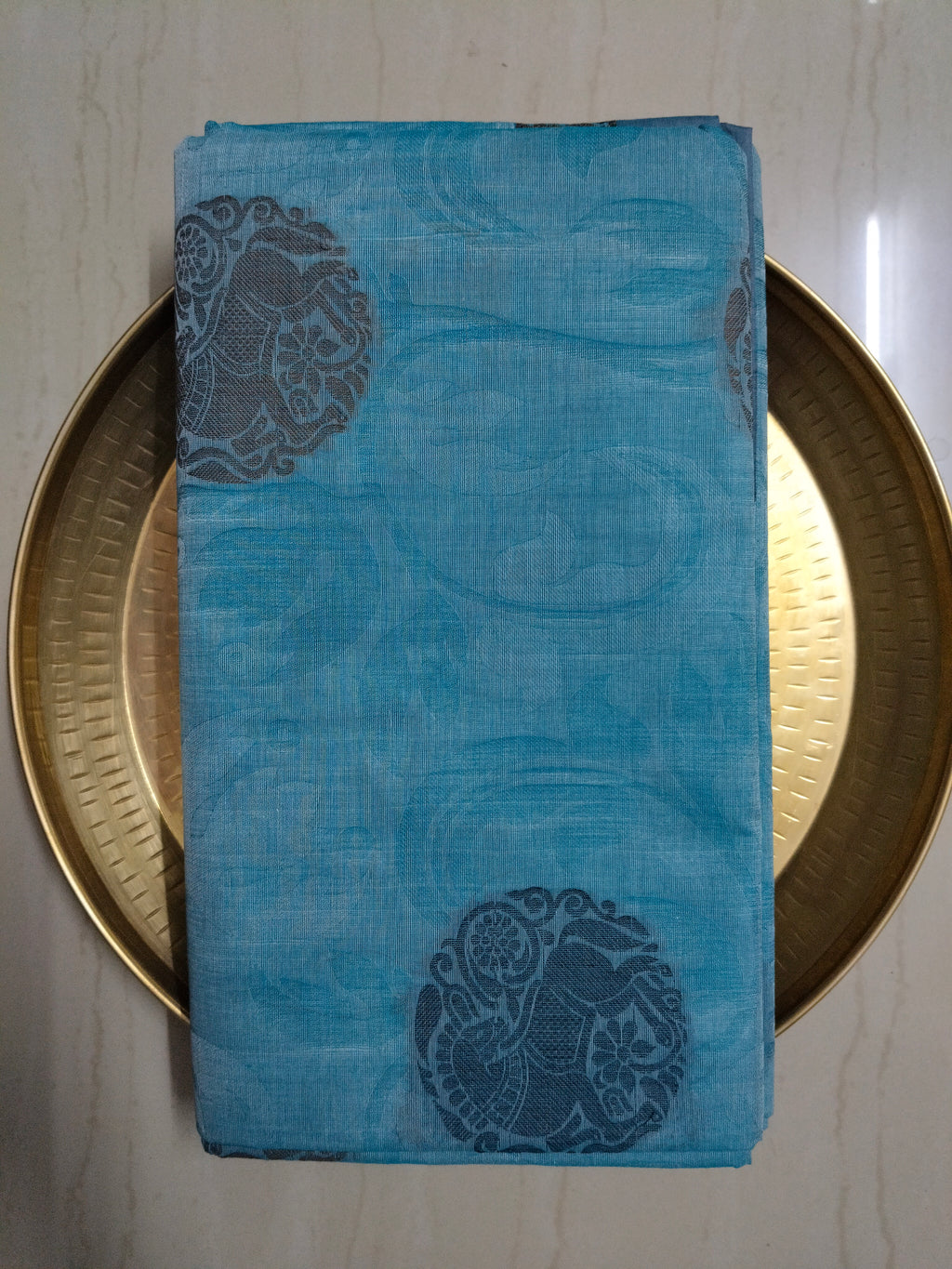 Blue embossed cotton saree with horse butta thread work