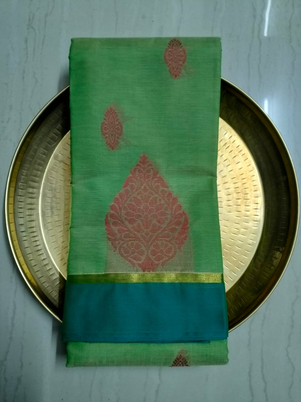 Light green dual tone cotton saree with thread buttas
