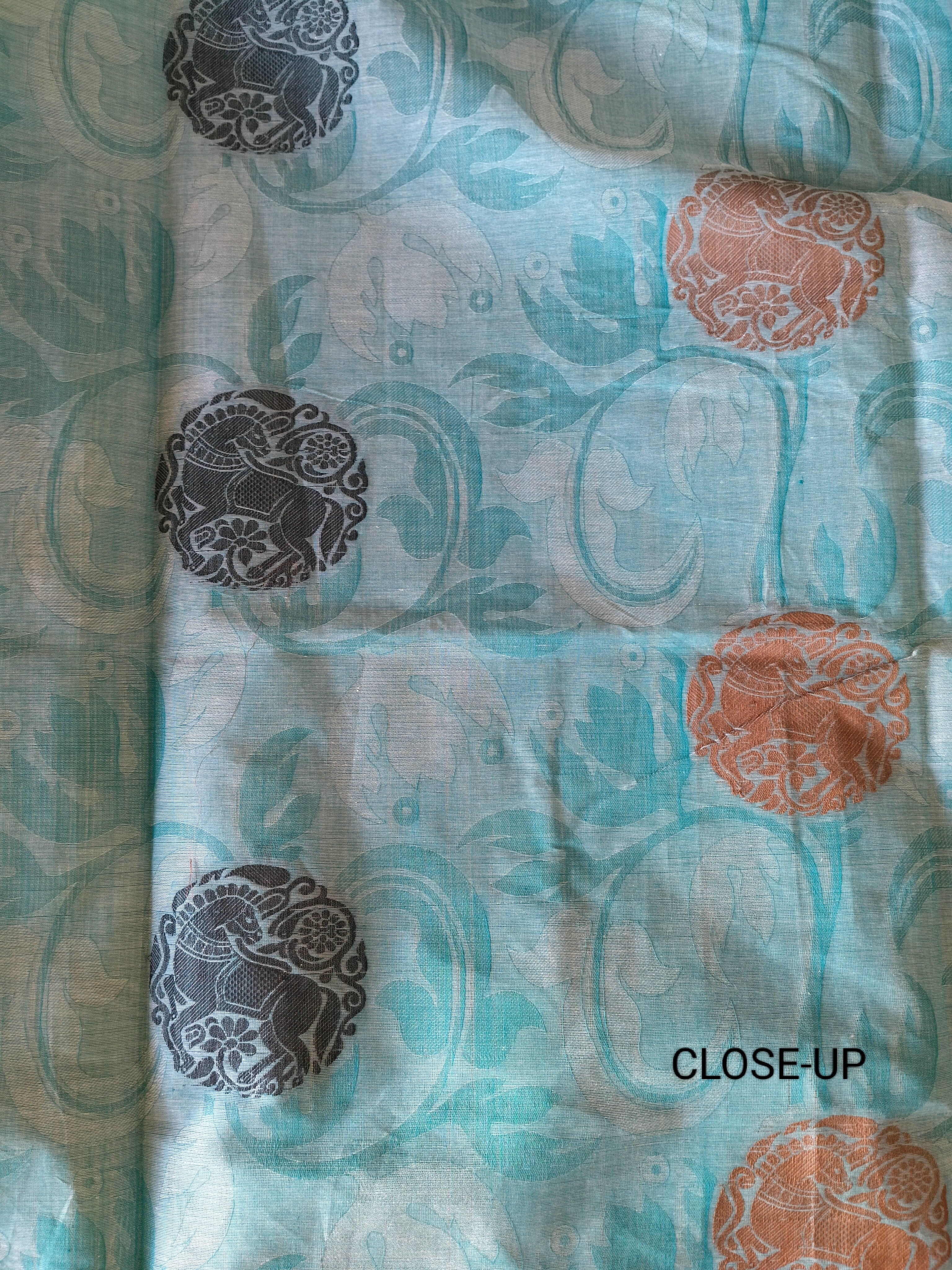 Blue embossed cotton saree with horse butta thread work