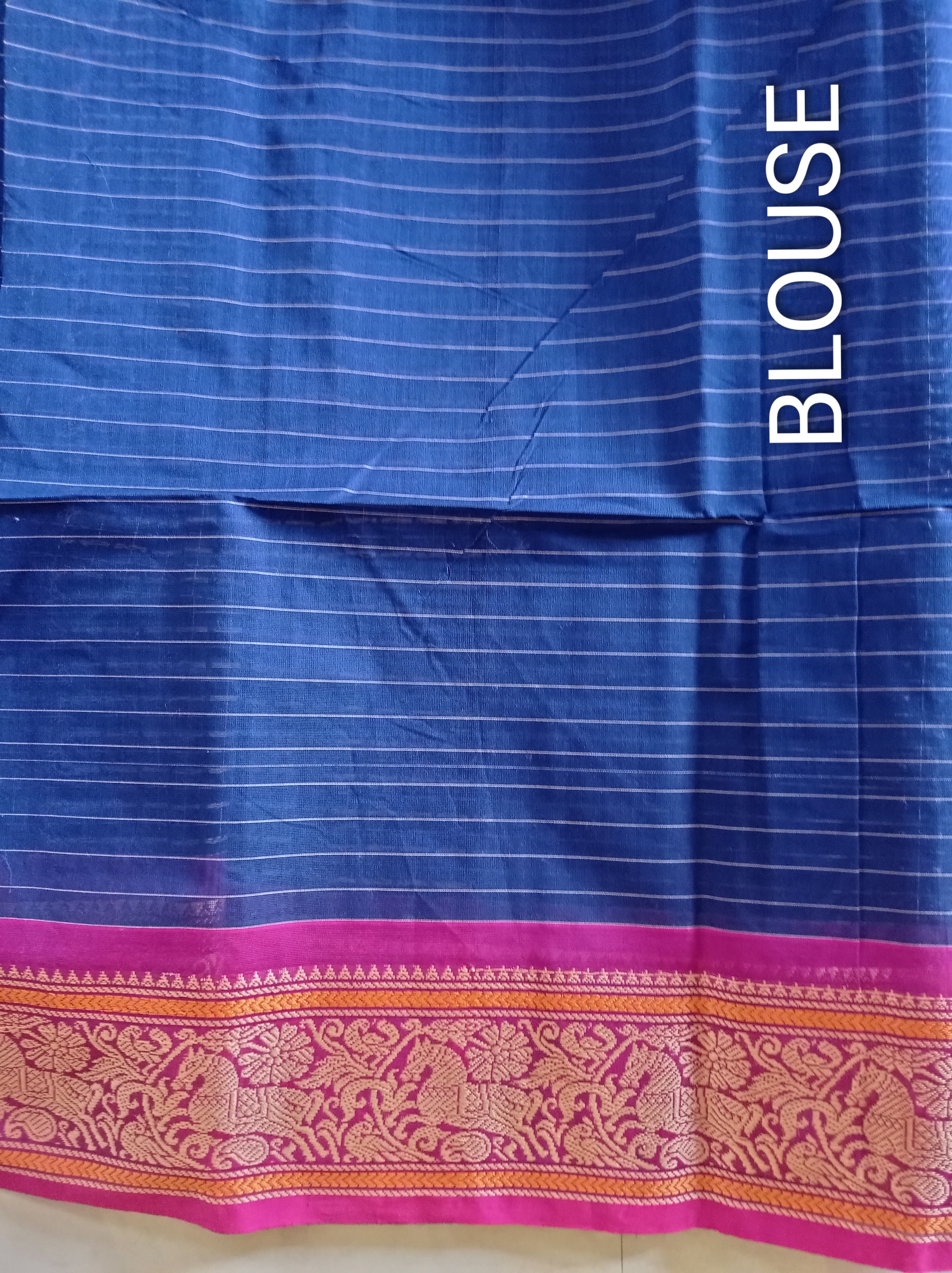 Blue Lakshadeepam saree with pink embroidered border
